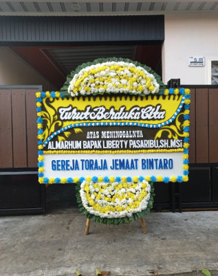 Papan Bunga Duka di Selo